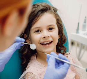 Two Young Girls Laughing Together | Pasadena Childrens Dentistry 